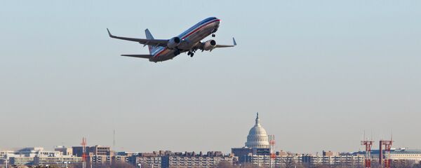 An American Airlines jet takes off from Reagan National Airport in Washington An American Airlines jet takes off from Reagan National Airport in Washington - Sputnik International