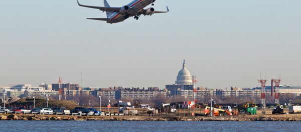An American Airlines jet takes off from Reagan National Airport in Washington An American Airlines jet takes off from Reagan National Airport in Washington - Sputnik International