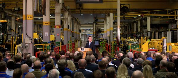 British Prime Minister David Cameron, background centre, delivers a speech on immigration to factory workers and members of the media, at JCB World Headquarters in Rocester, central England British Prime Minister David Cameron, background centre, delivers a speech on immigration to factory workers and members of the media, at JCB World Headquarters in Rocester, central England - Sputnik International