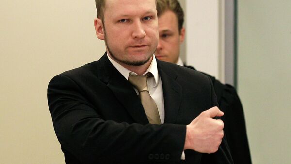 Accused Norwegian Anders Behring Breivik gestures as he arrives at the courtroom, in Oslo, Norway - Sputnik International