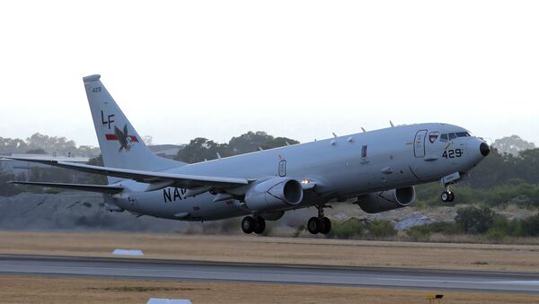A U.S. Navy P-8 Poseidon takes off from Perth Airport in 2014. - Sputnik International