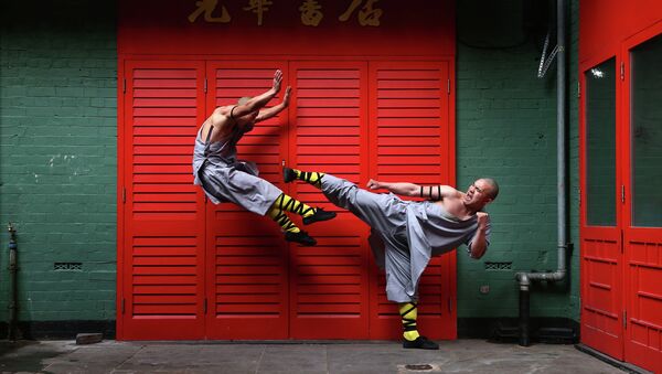 Shaolin monks pose for a photograph in Chinatown on February 23, 2015 in London, England - Sputnik International