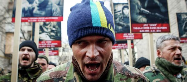 Activists of the Right Sector political party attend an anti-government march in Kiev February 25, 2015 Activists of the Right Sector political party attend an anti-government march in Kiev February 25, 2015 - Sputnik International
