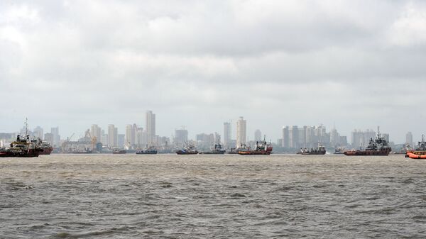 Ships are seen anchored in the Arabian sea following following the closure of the Mumbai port after a maritime accident involving the cargo ship MSC Chitra off the Mumbai coast on August 11, 2010 - Sputnik International