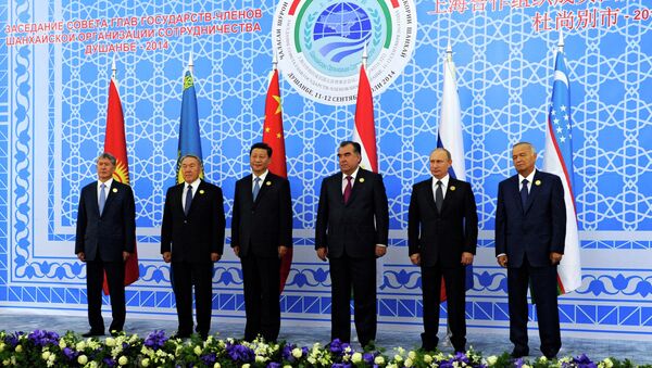 The head of the Shanghai Cooperation Organization (SCO) said the organization is interested in finding a peaceful solution to the Afghan crisis. - Sputnik International