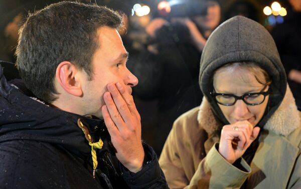Oppositioner Ilya Yashin and TV host Ksenia Sobchak on the site of the killing of leading opposition figure and former deputy prime minister Boris Nemtsov - Sputnik International