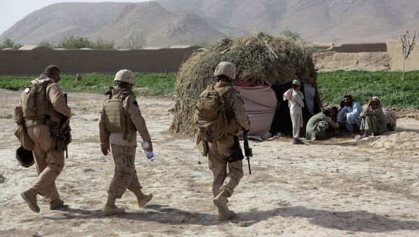 The US military compensated Afghan families for civilian deaths and injuries as part of its counterinsurgency strategy, which rests upon winning support of the local population, according to a report published by the online publication The Intercept - Sputnik International