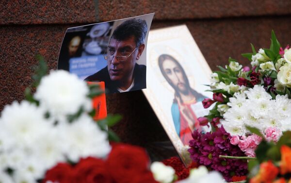 A photo, an icon and flowers are placed at the site where Boris Nemtsov was shot dead, near the Kremlin in central Moscow, February 28, 2015. - Sputnik International