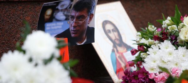 A photo, an icon and flowers are placed at the site where Boris Nemtsov was shot dead, near the Kremlin in central Moscow, February 28, 2015. A photo, an icon and flowers are placed at the site where Boris Nemtsov was shot dead, near the Kremlin in central Moscow, February 28, 2015. - Sputnik International
