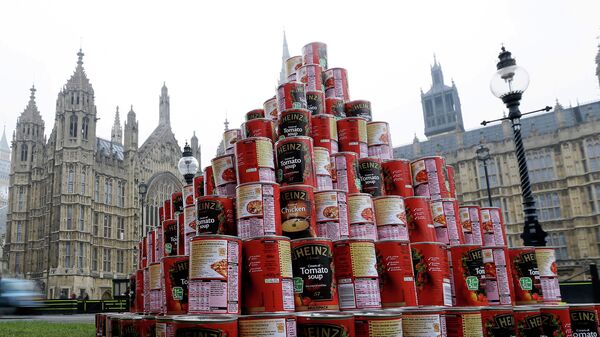 A pyramid of 468 cans of soup, which represents a seven-fold increase in the number of British people who make use of Food Banks since the current British coalition government came to power in 2010. - Sputnik International
