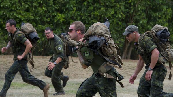Canada's special forces soldiers take part at the Acuatic tactics during 9th edition of the commando forces competition at the military base of Tolemaida, Colombia - Sputnik International