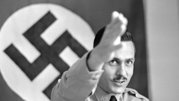 Matt Koehl, commander of the National Socialist White People’s Party, talks of the future of his movement at party headquarters in Arlington, Virginia on August 26, 1971. - Sputnik International