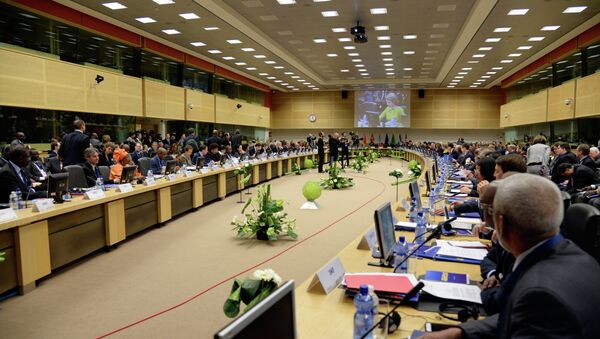 EU commissioners, leaders of Ebola-hit countries in west Africa and Queen Mathilde of Belgium (On screen) attend a conference on Ebola on March 3, 2015 in Brussels - Sputnik International
