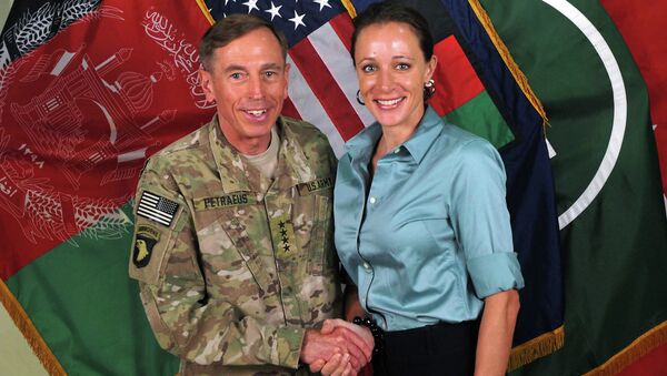 Former Commander of International Security Assistance Force and U.S. Forces-Afghanistan Gen. Davis Petraeus, left, shaking hands with Paula Broadwell, co-author of All In: The Education of General David Petraeus. Petraeus resigned as CIA director over his extramarital affair with his biographer, Broadwell. - Sputnik International