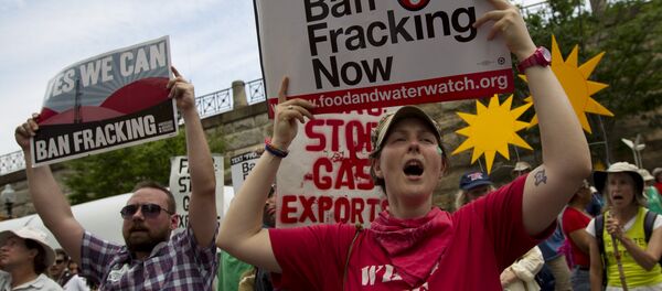 Demonstrators protest during a rally against fracking in Washington in July 2014. Demonstrators protest during a rally against fracking in Washington in July 2014. - Sputnik International
