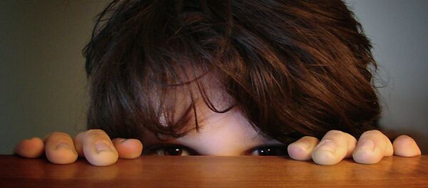A child hiding behind the table - Sputnik International