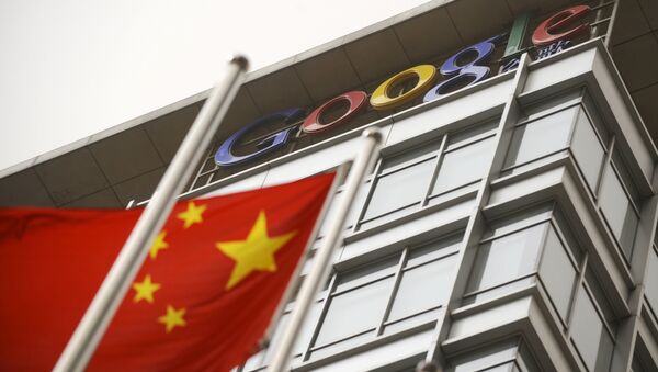 A Chinese flag flies next to the Google company logo outside the Google China headquarters in Beijing on March 22, 2010 - Sputnik International