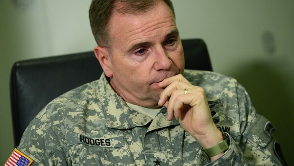Commanding General Ben Hodges, United States Army Europe (USAREUR) attends a press conference at the headquarter of the military air base in Papa, Hungary on February 26, 2015 - Sputnik International