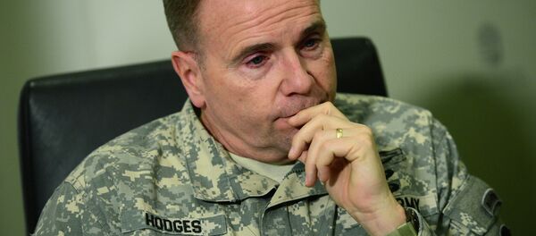 Commanding General Ben Hodges, United States Army Europe (USAREUR) attends a press conference at the headquarter of the military air base in Papa, Hungary on February 26, 2015 - Sputnik International