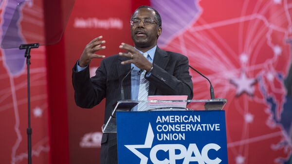 US conservative Ben Carson addresses the annual Conservative Political Action Conference (CPAC) at National Harbor, Maryland, outside Washington,DC on February 26, 2015 - Sputnik International