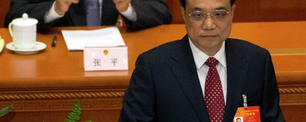 Chinese Premier Li Keqiang delivers the work report during the opening session of the National People's Congress at the Great Hall of the People in Beijing, Thursday, March 5, 2015 Chinese Premier Li Keqiang delivers the work report during the opening session of the National People's Congress at the Great Hall of the People in Beijing, Thursday, March 5, 2015 - Sputnik International
