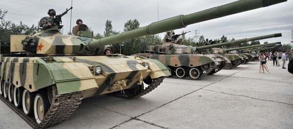 Chinese soldiers pose in tanks during a training session at the Academy of Armored Forces Engineering of the Peoples Liberation Army (PLA) in Beijing, China, 22 July 2014 Chinese soldiers pose in tanks during a training session at the Academy of Armored Forces Engineering of the Peoples Liberation Army (PLA) in Beijing, China, 22 July 2014 - Sputnik International