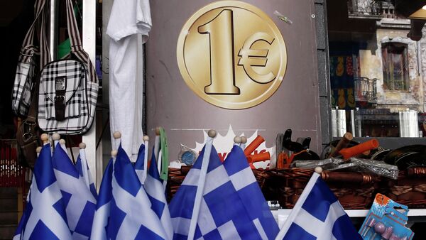 Greek national flags are displayed for sale at the entrance of a one Euro shop in Athens - Sputnik International