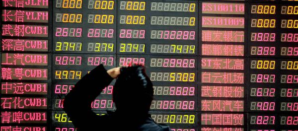 A man reacts as he looks at the stock price monitor at a private securities company Monday, March 16, 2009 in Shanghai, China. A man reacts as he looks at the stock price monitor at a private securities company Monday, March 16, 2009 in Shanghai, China. - Sputnik International