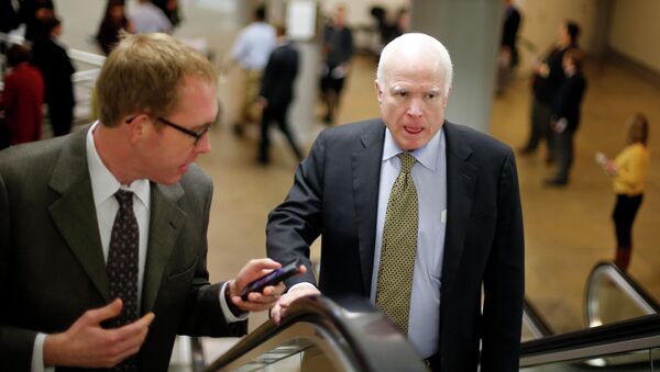 U.S. Senator John McCain (R-AZ) (R) arrives for a vote on whether to overturn a presidential veto of the Keystone XL pipeline, at the U.S. Capitol in Washington, March 4, 2015 - Sputnik International