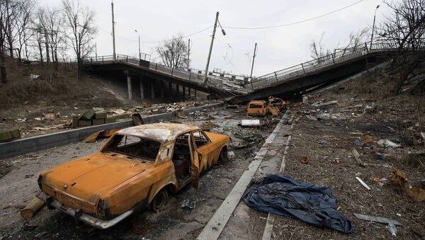 Wrecked cars are pictured near a destroyed bridge near Donetsk airport March 3, 2015 - Sputnik International