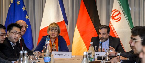 EU political director Helga Schmid (CL) seats next to Iran's deputy foreign minister Abbas Araqchi (R) at the opening of nuclear talks between Iran and Members of the P5+1 group on March 5, 2015 in Montreux EU political director Helga Schmid (CL) seats next to Iran's deputy foreign minister Abbas Araqchi (R) at the opening of nuclear talks between Iran and Members of the P5+1 group on March 5, 2015 in Montreux - Sputnik International