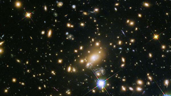 An example of a galaxy cluster: the galaxy cluster MACS J1149.5+223, whose light took over 5 billion years to reach us. - Sputnik International