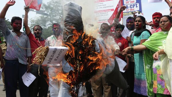 Activists of the Communists Party of India (CPI) burn an effigy representing the rapists convicted in the Dec. 16, 2012 gang rape in a moving bus in New Delhi, in Hyderabad, India. - Sputnik International