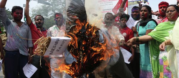 Activists of the Communists Party of India (CPI) burn an effigy representing the rapists convicted in the Dec. 16, 2012 gang rape in a moving bus in New Delhi, in Hyderabad, India. Activists of the Communists Party of India (CPI) burn an effigy representing the rapists convicted in the Dec. 16, 2012 gang rape in a moving bus in New Delhi, in Hyderabad, India. - Sputnik International