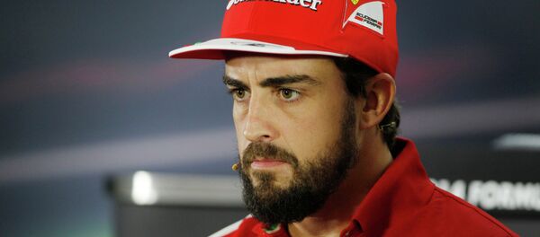 Ferrari driver Fernando Alonso of Spain answers to reporters during a news conference at the Yas Marina racetrack in Abu Dhabi, United Arab Emirates, Thursday, Nov. 20, 2014. Two-time Formula One champion Fernando Alonso is leaving Ferrari after the final race of the season and will be replaced by four-time champion Sebastian Vettel. The 33-year-old Spanish driver had said earlier this season that his future was elsewhere, likely at McLaren. Ferrari driver Fernando Alonso of Spain answers to reporters during a news conference at the Yas Marina racetrack in Abu Dhabi, United Arab Emirates, Thursday, Nov. 20, 2014. Two-time Formula One champion Fernando Alonso is leaving Ferrari after the final race of the season and will be replaced by four-time champion Sebastian Vettel. The 33-year-old Spanish driver had said earlier this season that his future was elsewhere, likely at McLaren. - Sputnik International
