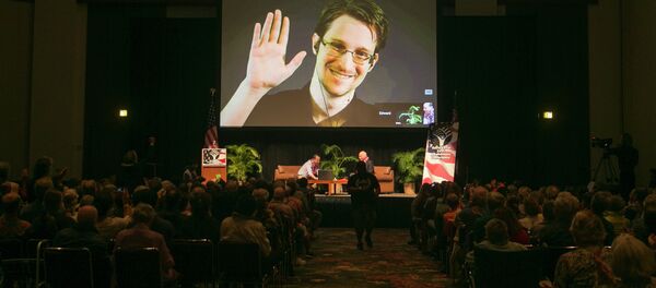 NSA leaker Edward Snowden appears on a live video feed broadcast from Moscow at an event sponsored by the ACLU Hawaii in Honolulu NSA leaker Edward Snowden appears on a live video feed broadcast from Moscow at an event sponsored by the ACLU Hawaii in Honolulu - Sputnik International