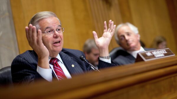 Chairman of the Senate Foreign Relations Committee, Sen. Robert Menendez, D-NJ., left, gestures as he speaks as ranking member Sen. Bob Corker, R-Tenn., sits right, during a hearing on Capitol Hill in Washington, Wednesday, July 9, 2014, to examine Russia and developments in Ukraine.  - Sputnik International