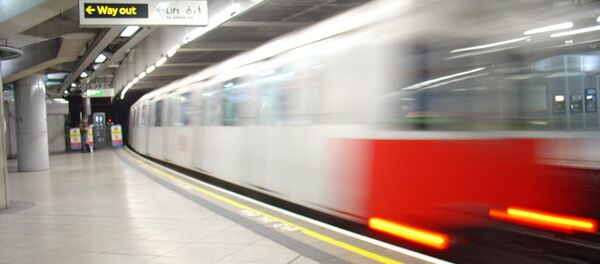 A District line tube train leaving Westminster station A District line tube train leaving Westminster station - Sputnik International