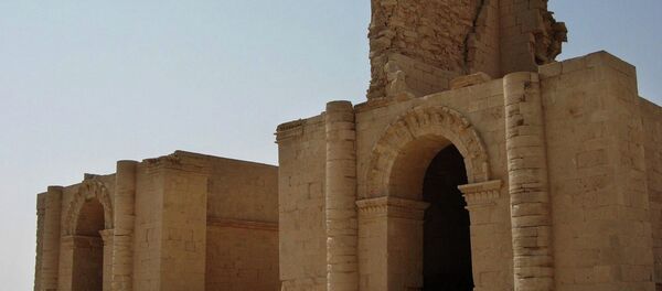 FILE - In this file photo taken July 27, 2005, two temples stand over 1,750 years after the Sassanian empire razed the Mesopotamian city of Hatra, 320 kilometers (200 miles) north of Baghdad, Iraq. Islamic State militants control the 2,300-year-old city of Hatra, a well preserved complex of temples south of Mosul and a UNESCO World Heritage site. FILE - In this file photo taken July 27, 2005, two temples stand over 1,750 years after the Sassanian empire razed the Mesopotamian city of Hatra, 320 kilometers (200 miles) north of Baghdad, Iraq. Islamic State militants control the 2,300-year-old city of Hatra, a well preserved complex of temples south of Mosul and a UNESCO World Heritage site. - Sputnik International
