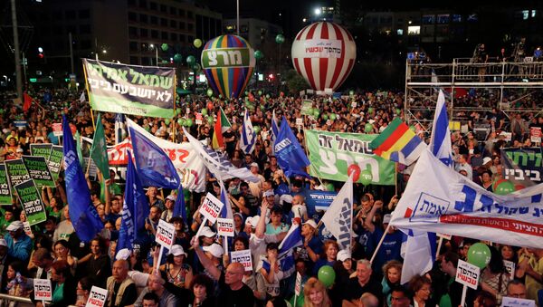 Israelis take part in a rally - Sputnik International