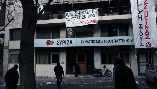 Banners, reading Solidarity With Hunger Strikers'', hang on March 8,2015 at the headquarters of the ruling Syriza party in Athens that were occupied by anarchists in solidarity to hunger strikers and their demands. - Sputnik International