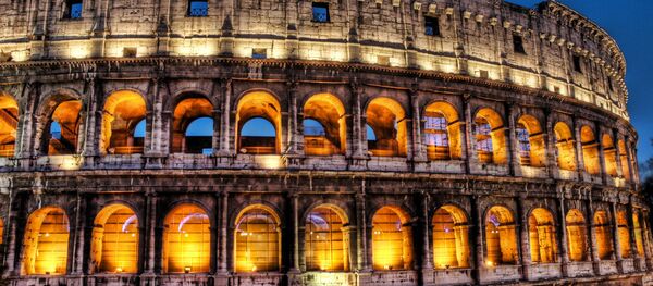 The Colosseum at dusk The Colosseum at dusk - Sputnik International