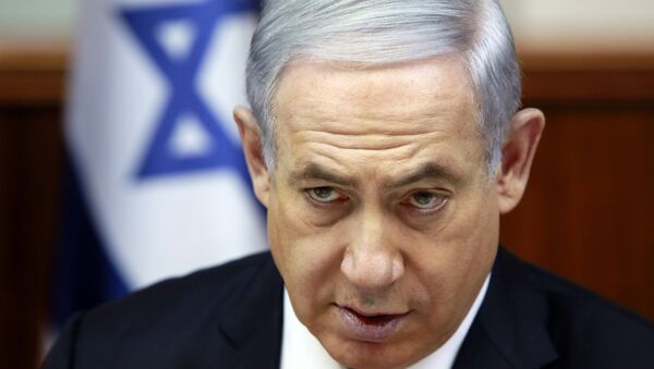 Israeli Prime Minister Benjamin Netanyahu chairs the weekly cabinet meeting at his Jerusalem office, Sunday, March 8, 2015. Tens of thousands of Israelis gathered Saturday night at a Tel Aviv square under the banner Israel wants change and called for Netanyahu to be replaced in March 17 national elections. - Sputnik International