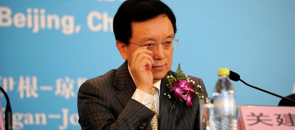 President Guan Jianzhong of Dagong Global Credit Rating reacts as he attends a press conference in Beijing - Sputnik International