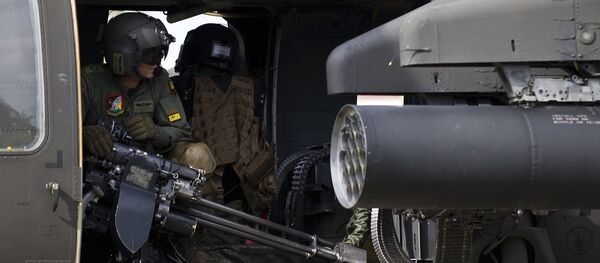 A Colombian Air Force helicopter takes off at a military base in Quibdo, Department of Choco, Colombia, on November 19, 2014, before heading to reinforce search operations of General Ruben Alzate who was kidnapped by the FARC - Sputnik International