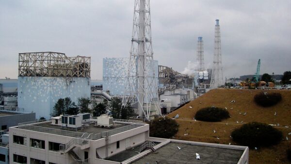 In this image released by Tokyo Electric Power Co., smoke billows from the No. 3 unit among four housings cover four reactors at the Fukushima Dai-ichi nuclear complex in Okumamachi, Fukushima Prefecture, northeastern Japan, on Tuesday, March 15, 2011 - Sputnik International