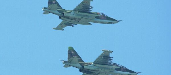 Sukhoi Su-25UB '93 red' & Su-25SM '25 red' - Sputnik International