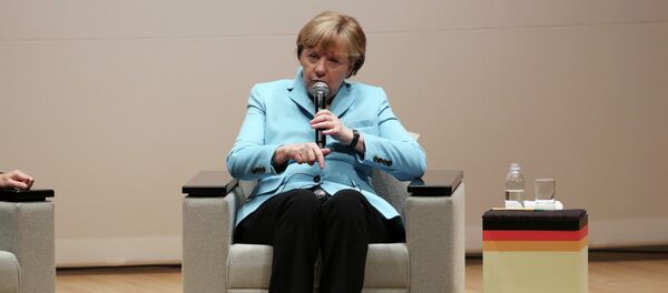 Germany's Chancellor Angela Merkel speaks during a lecture meeting at Asahi Shimbun headquarters in Tokyo, Monday, March 9, 2015 - Sputnik International