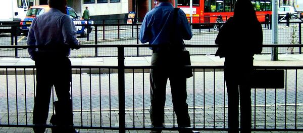 Londoners queuing for a bus at a mainline rail terminal the morning after the 7/7 attack on London. Londoners queuing for a bus at a mainline rail terminal the morning after the 7/7 attack on London. - Sputnik International