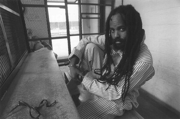 Mumia Abu-Jamal in prison circa 1998 Mumia Abu-Jamal in prison circa 1998 - Sputnik International